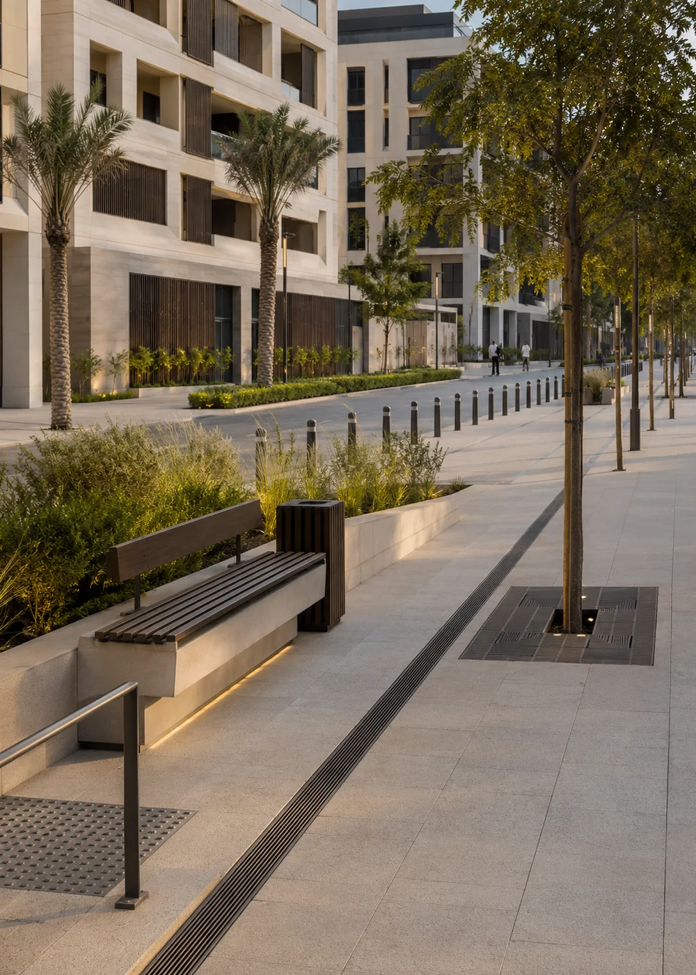 Public realm environment with benches, bollards, planters, paving, drainage, and pedestrian streetscape elements